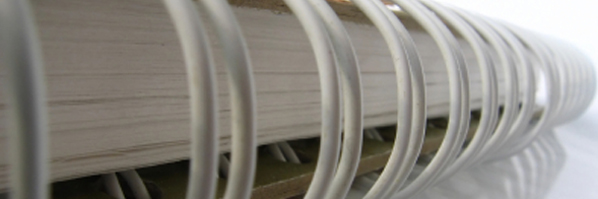 What are the advantages of spiral binding?
